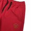 Men wearing red straight fit track pants with elastic waistband and side pockets