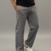 Men wearing grey straight fit track pants with elastic waistband