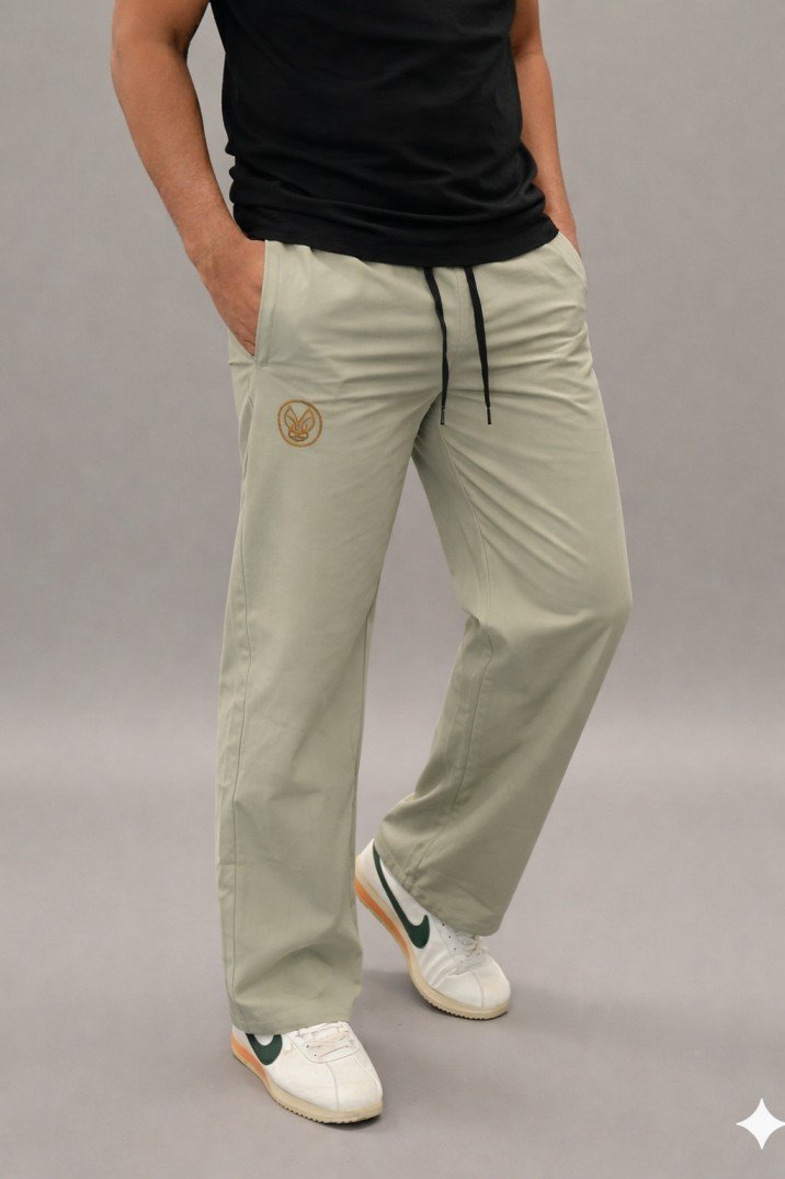 Men wearing olive green straight fit track pants with drawstring waist